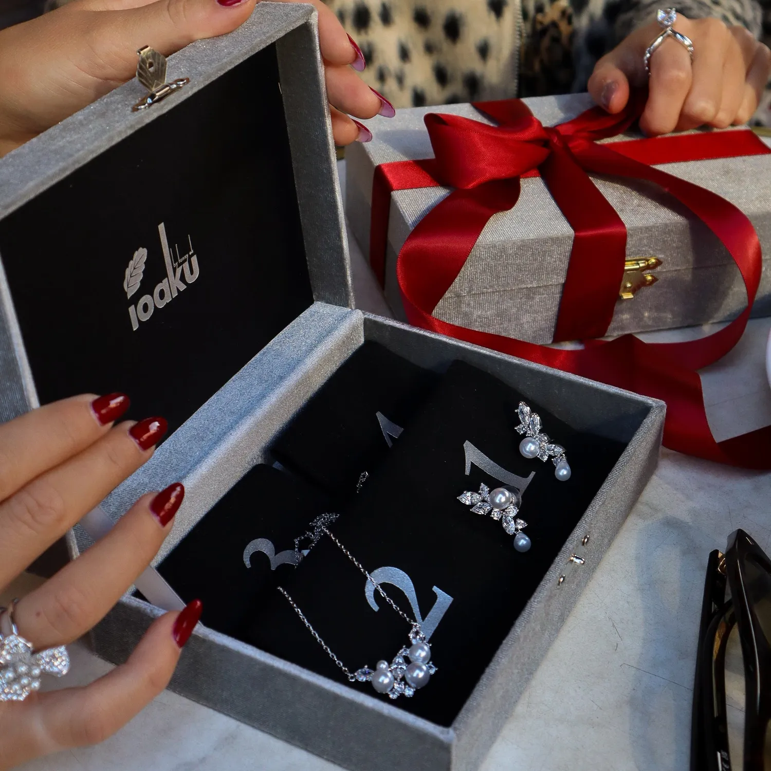 IOAKU Pearl Constellation adventskalender gull 4 deler